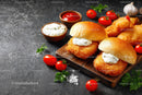 Crispy Fish Sandwiches with Cherry Tomatoes and Fresh Herbs