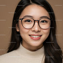 Portrait of a Smiling Young Woman in Frame, Glasses, and Warm Background