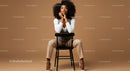 Elegant Woman in Beige Pants and White Top Sitting on Black Chair