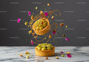 Gourmet pistachio tart with caramel and flower petals
