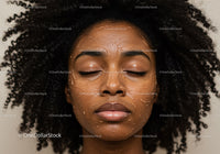 Close-up of a Woman with Curly Hair Wearing a Facial Mask