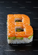 Creative Sushi Roll Shaped Like Number Eight on Black Surface