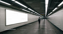 Minimalist Subway Tunnel with Tiled Walls and Modern Lighting