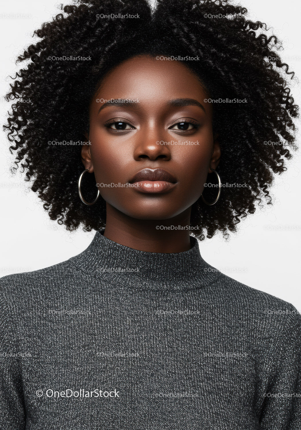 Close-Up of a Beautiful Woman with Curly Hair and Elegant Style