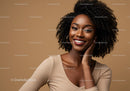 Confident Smiling African American Woman with Curly Hair in Beige Top