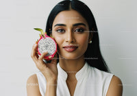 Portrait of a Woman Holding a Dragon Fruit with Bright Natural Lighting