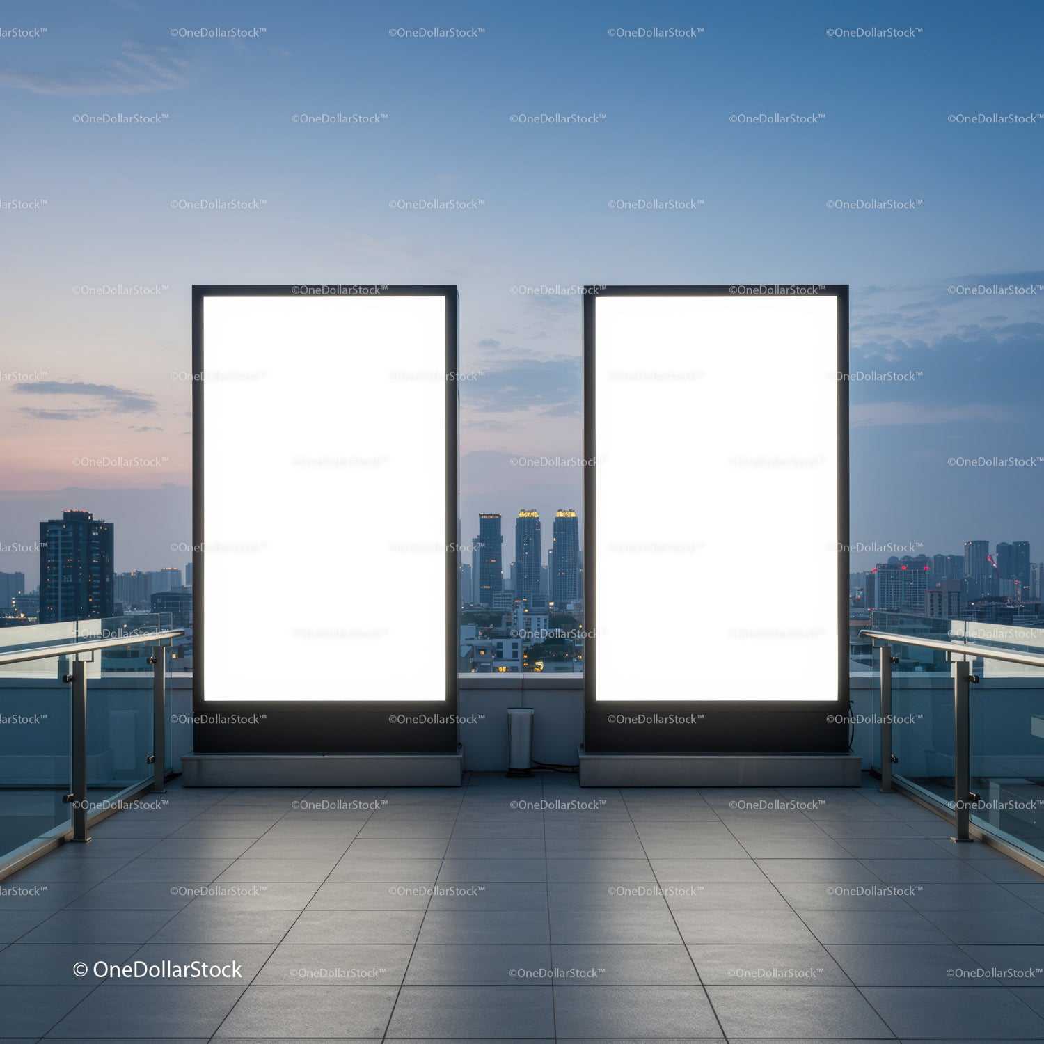 Blank illuminated billboards on rooftop with city skyline