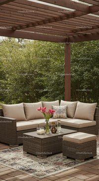 Elegant Outdoor Patio with Wicker Sofa and Pink Tulips in Garden