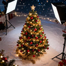Christmas tree decorated with lights and red baubles