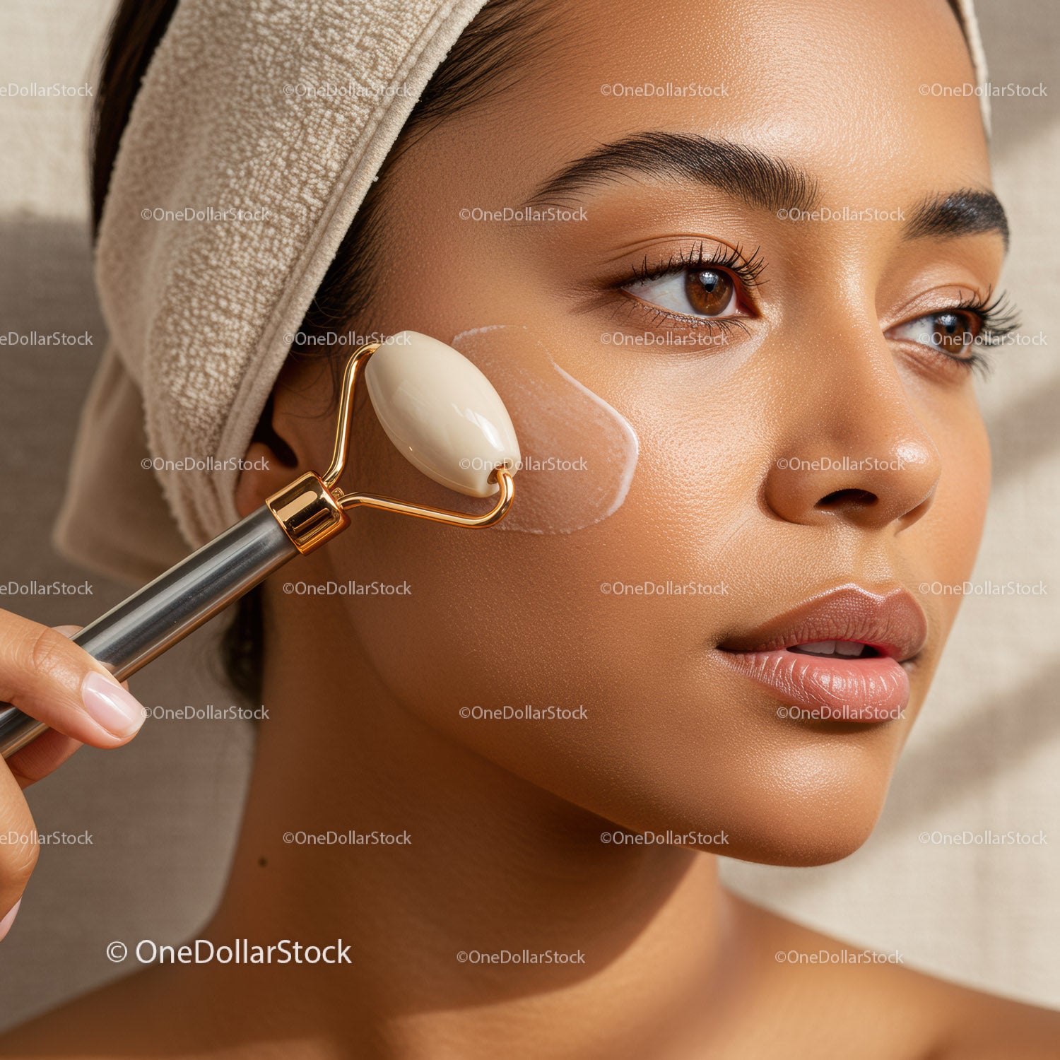 Close-Up of Woman Using Jade Roller for Facial Skincare Routine