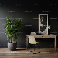 Minimalist Home Office with Large Indoor Plant and Artistic Wall Decor