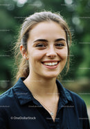 Smiling Young Woman Outdoors in Natural Setting