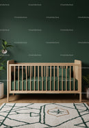 Modern Baby Crib in Cozy Nursery with Green Wall and Wooden Decor