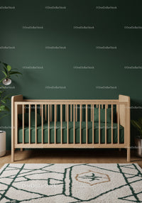 Modern Baby Crib in Cozy Nursery with Green Wall and Wooden Decor