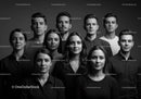Serious young adults posing for black and white portrait