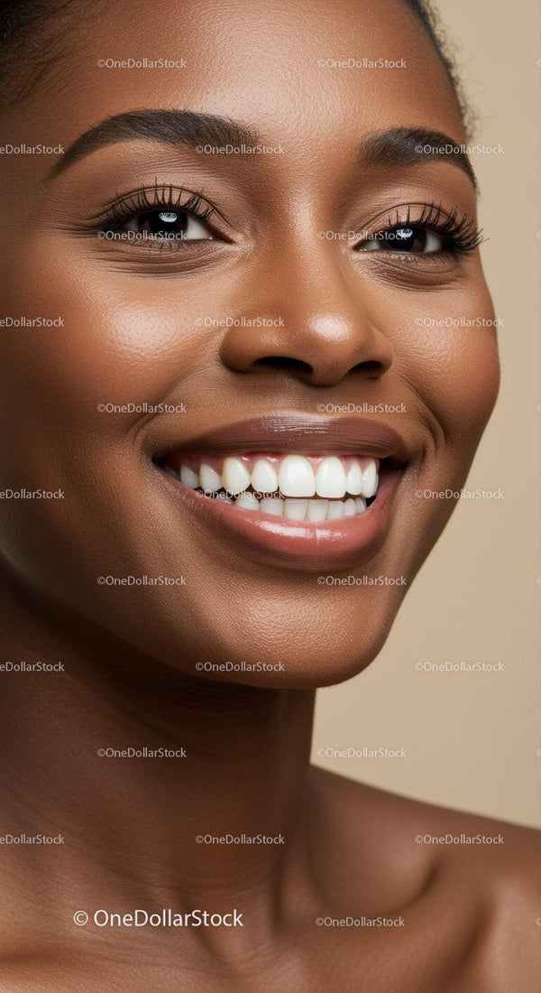 Close up portrait of smiling woman with glowing skin