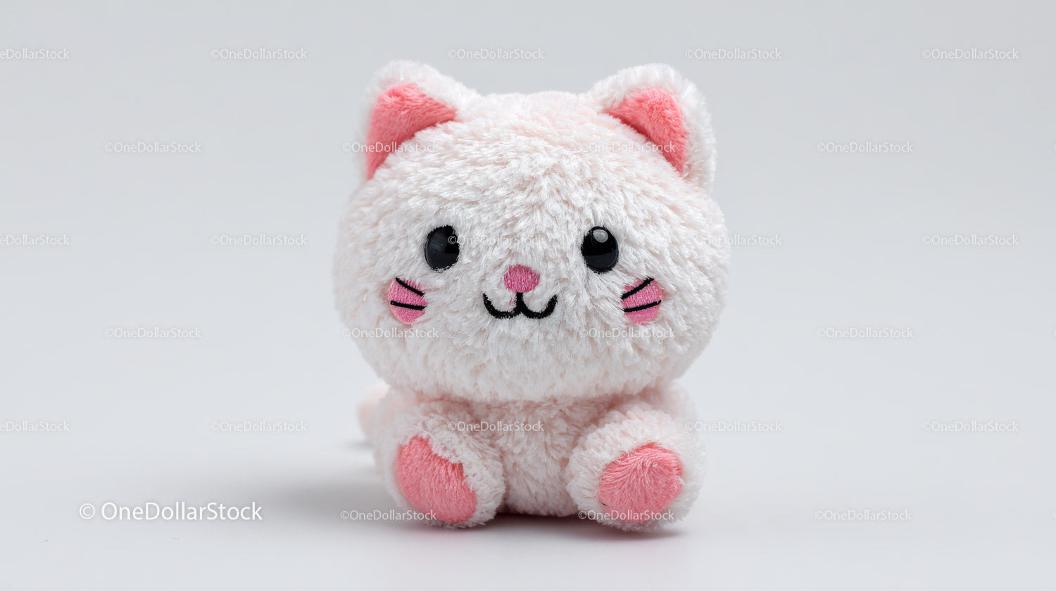 Cute Plush Cat Toy in Soft Brown and White with Black Details