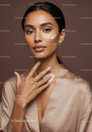 Elegant Woman Applying Skincare Cream with Calm Expression