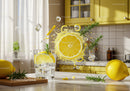 Refreshing lemon water with rosemary and ice cubes splash