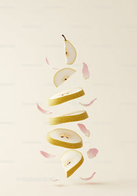 Floating Slices of Pear with Delicate Pink Petals