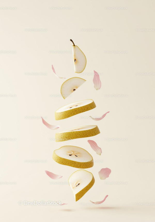 Floating Slices of Pear with Delicate Pink Petals