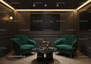 Cozy modern lounge with green velvet armchairs and star art