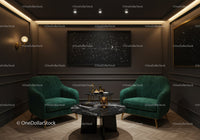 Cozy modern lounge with green velvet armchairs and star art