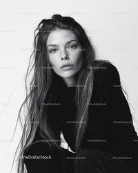 Elegant Black and White Portrait of a Confident Woman with Long Hair