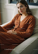 Young Woman Wearing Brown Outfit Relaxing on Sofa in Cozy Home