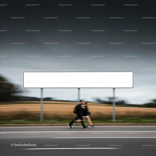 Two people walking past empty roadside billboard outdoors JPG Mockup Image