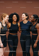 Happy diverse women enjoying fitness moment indoors