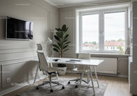Bright Modern Home Office with Large Window and Green Plant