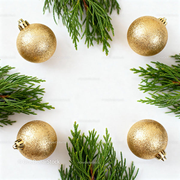 Golden Christmas Ornaments with Fresh Green Pine Branches