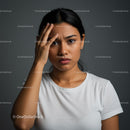 Woman with Concerned Expression Needing Relief with Gray Background