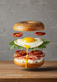 Deconstructed bagel with fried egg and sun-dried tomatoes
