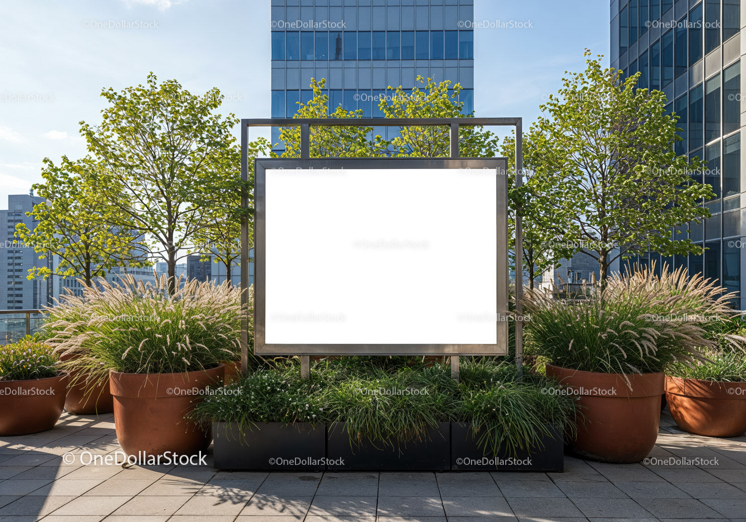 Blank billboard surrounded by greenery on urban terrace
