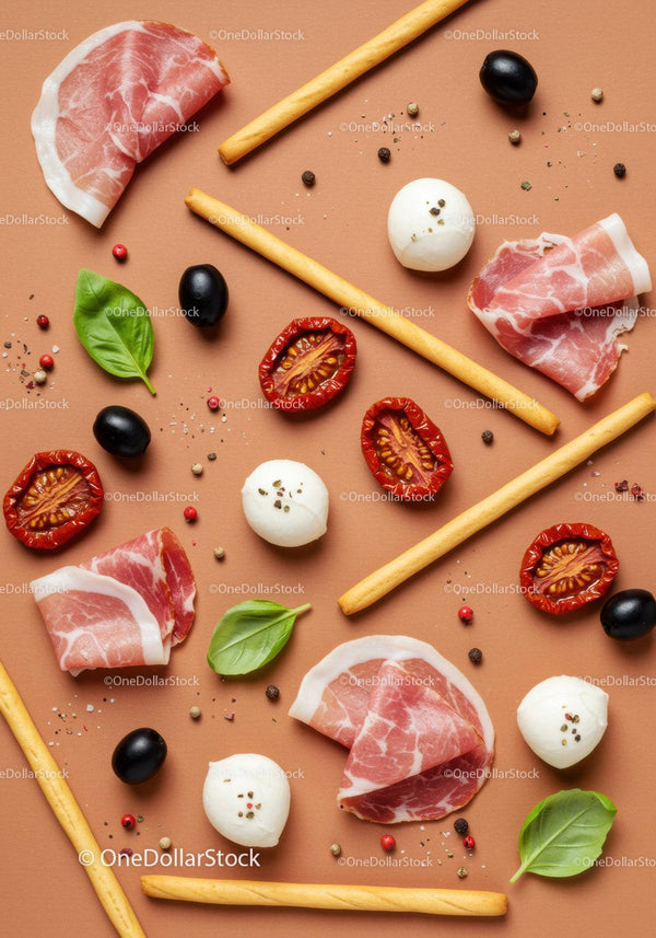 Italian antipasto flat lay with prosciutto and mozzarella
