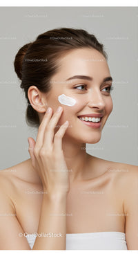 Young Woman Applying Skincare Cream for Flawless Healthy Skin