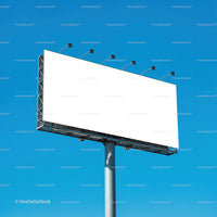 Large blank billboard against clear blue sky