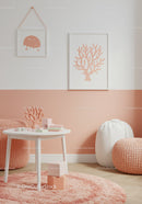 Cute Minimalist Nursery with Coral Wall Art and Soft Textures