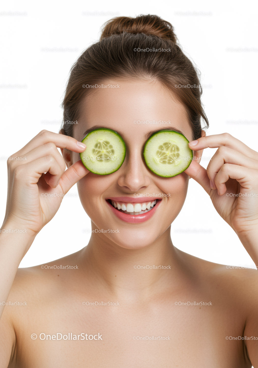 Smiling Woman Holding Cucumber Slices Over Eyes for Fresh Natural Look