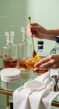 Elegant Cocktail with Lemon Twist in a Stylish Bar Setting
