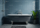 Vintage freestanding bathtub in stylish blue bathroom