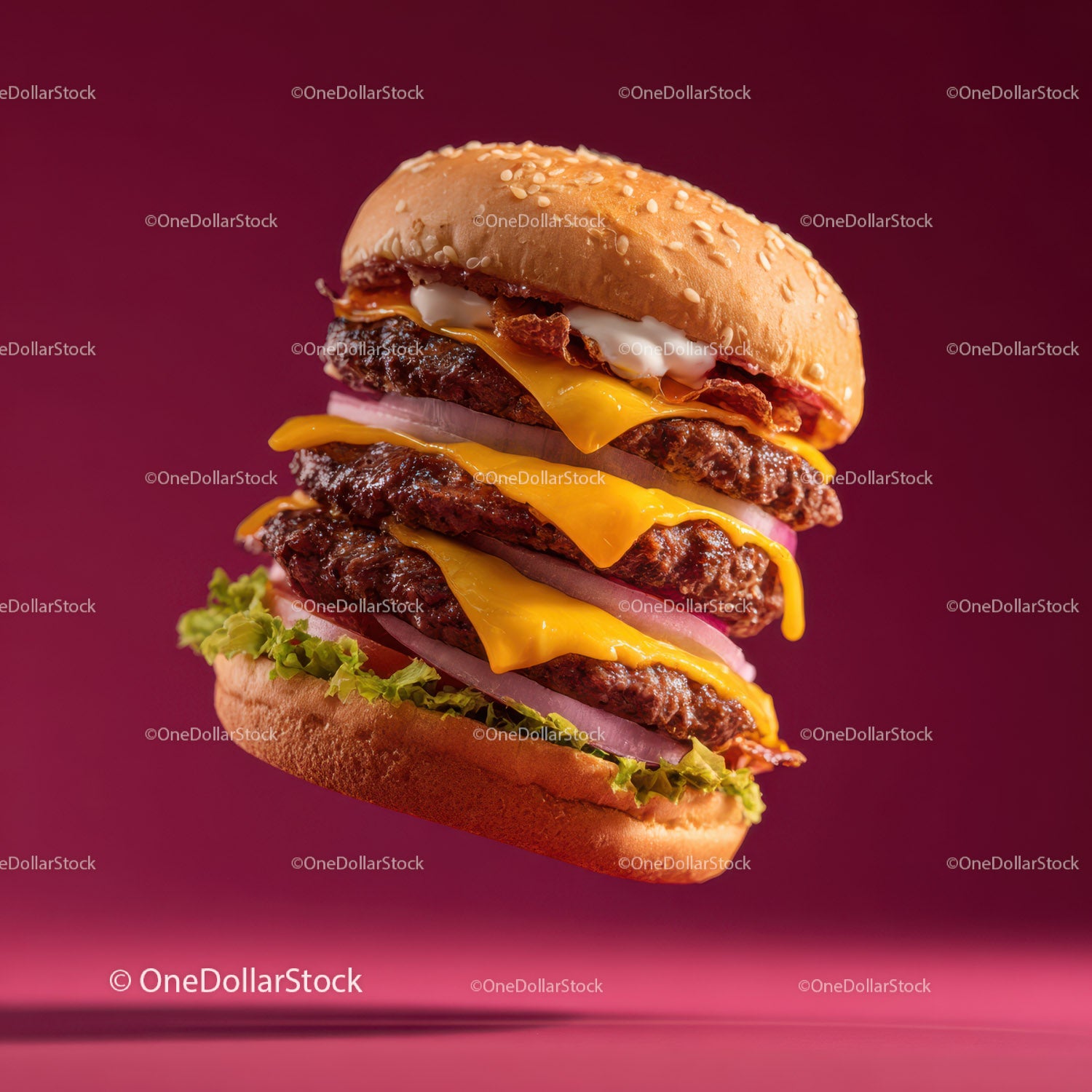 Stacked Cheeseburger with Multiple Beef Patties and Fresh Toppings