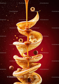 Spiral Pancakes Drizzled with Caramel and Hazelnuts