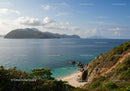 Beautiful Tropical Beach with Turquoise Waters and Rocky Cliffs