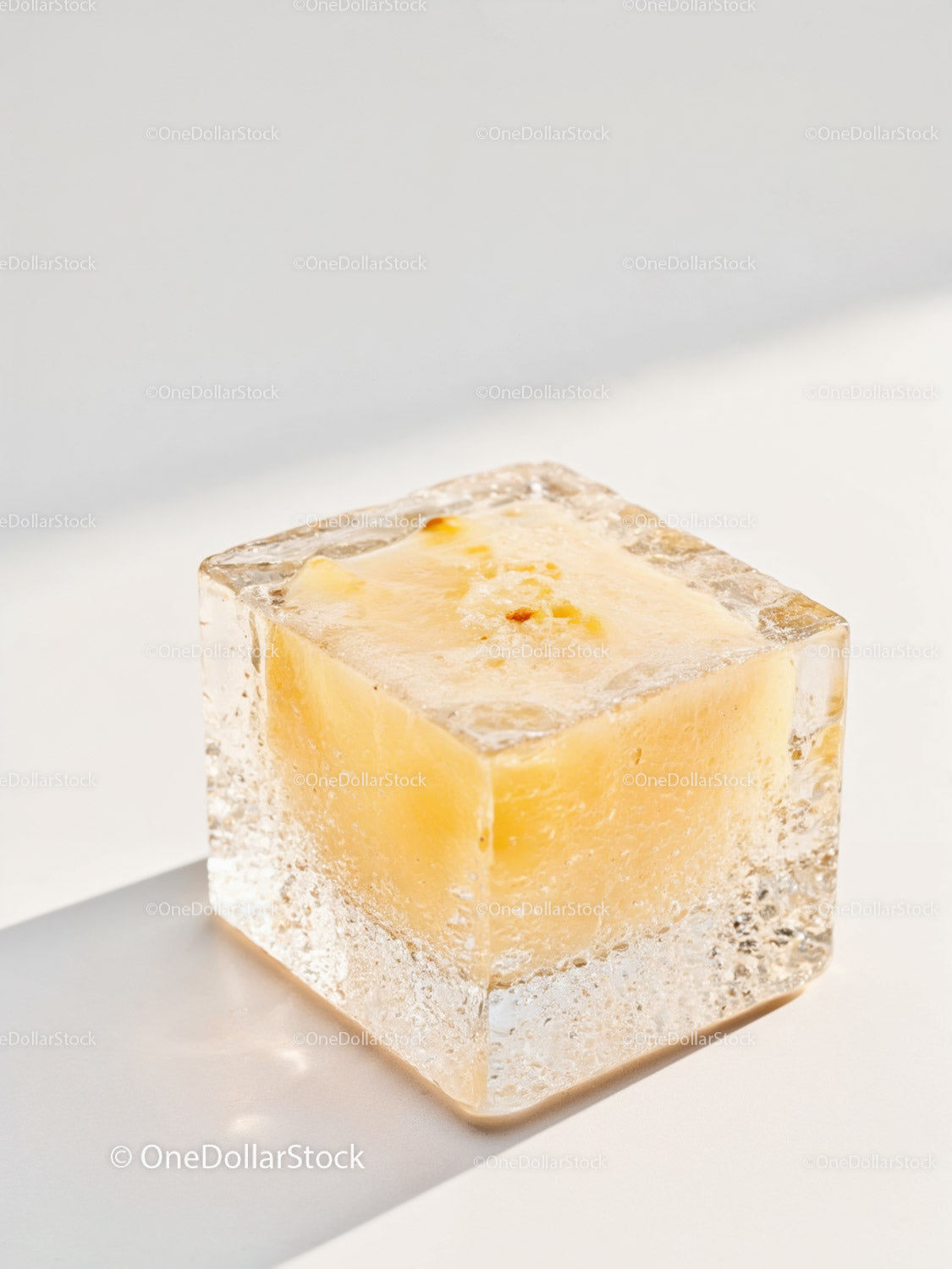Natural soap bar embedded in clear ice cube