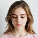 Serene Young Woman Portrait with Soft Lighting and Natural Makeup