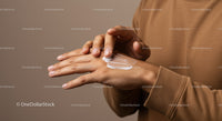 Close-Up of Person Applying Hand Lotion for Skin Care and Moisturizing