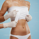 Woman in Bandage During Medical Treatment on Blue Background